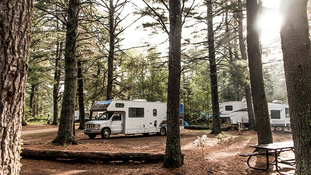 Two campers parked after receiving thorough rv inspection services 